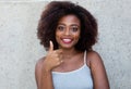 African american woman with typical afro hair showing thumb up Royalty Free Stock Photo