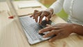 African american woman using laptop sitting on table at home Royalty Free Stock Photo