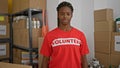 African american woman volunteer standing with serious face at office