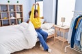 African american woman waking up stretching arms at bedroom Royalty Free Stock Photo