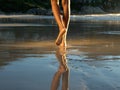 African american woman walking alone on the beach Royalty Free Stock Photo