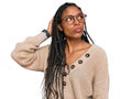 African american woman wearing casual clothes confuse and wondering about question