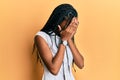 African american woman wearing casual clothes with sad expression covering face with hands while crying Royalty Free Stock Photo