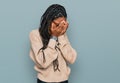 African american woman wearing casual clothes with sad expression covering face with hands while crying Royalty Free Stock Photo