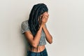 African american woman wearing casual clothes with sad expression covering face with hands while crying Royalty Free Stock Photo