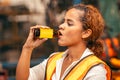 African American Woman Worker Drinking Energy Drink During Relax Brake Work In Heavy Factory Royalty Free Stock Photo