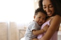 African-American woman with her baby. Happiness of motherhood Royalty Free Stock Photo