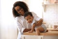 African-American woman with her baby. Happiness of motherhood Royalty Free Stock Photo