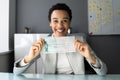 African American Women Holding Payroll Cheque Royalty Free Stock Photo