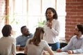 African American woman standing and talking at briefing Royalty Free Stock Photo