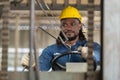 African american worker man wear safety helmet driver forklift warehouse in factory. Male worker industrial operate. control Royalty Free Stock Photo