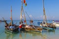 African ancient wooden boat on water surface. Zanzibar island