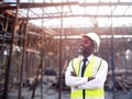 African architects engineer man with hardhat work together in the inside the construction building site.Engineering concepts