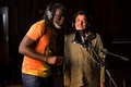 African Artists Tiken Jah Fakoly, Cote d`Ivoire, Rachid Taha, Algeria singing in a SABC recording studio