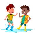 African And Asian Kids In Boots Jump In Puddle After The Rain Vector. Isolated Illustration