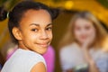 African beautiful girl portrait near yellow tent