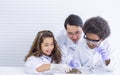 African black boy and caucasian girl studying science in classroom at school Royalty Free Stock Photo