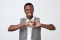 African black man making out of hands heart. Doing charity work Royalty Free Stock Photo