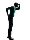 African black man standing tiptoe looking away silhouette Royalty Free Stock Photo