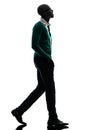 African black man walking looking up silhouette Royalty Free Stock Photo