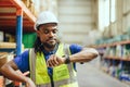 African Black people Engineer male worker looking at wristwatch time check. Industry factory working hours afternoon break times