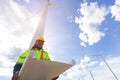 African black smart engineer professional techician male working service maintenance wind turbines Royalty Free Stock Photo