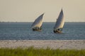 African boats sails in the ocean at sunset Royalty Free Stock Photo