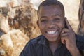 African boy on cell phone Royalty Free Stock Photo