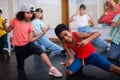 African boy and girl training hip hop during group class Royalty Free Stock Photo