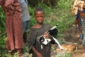 African boy holding baby goat in west Africa, kabala, Sierra Leone Royalty Free Stock Photo