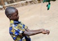 African Boy Washing Hands Properly to Avoid Contamination with Coronavirus or Virus or Bacteria