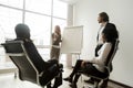 African business team listening to speakers giving presentation Royalty Free Stock Photo