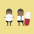 African businessman with big pill. Royalty Free Stock Photo