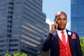 African businessman in the city talking on mobile phone Royalty Free Stock Photo