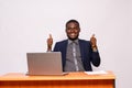 African businessman does thumbs up gesture