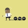 African businessman dragging chains and big ball, Debt Tax and Bill burden concept. Royalty Free Stock Photo