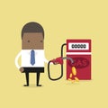 African businessman and gas station.