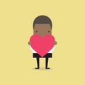 African businessman holding heart shape. Royalty Free Stock Photo