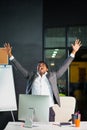 African businessman at office, success gesture, goal reached, happy man Royalty Free Stock Photo