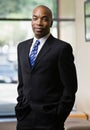 African businessman posing in full suit