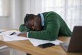 African Businessman Sleeping Near Laptop Tired Of Work In Office Royalty Free Stock Photo