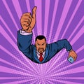 African businessman with a smartphone like, thumbs up. Flying like a superhero Royalty Free Stock Photo
