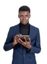 African businessman with tablet in hands, isolated over white background Royalty Free Stock Photo