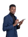 African businessman with tablet in hands, isolated over white background Royalty Free Stock Photo