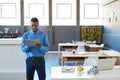 African businessman working with a digital tablet in an office Royalty Free Stock Photo