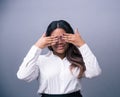 African businesswoman covering her eyes Royalty Free Stock Photo