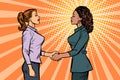 African and Caucasian businesswomen shaking hands Royalty Free Stock Photo