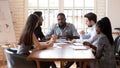 African ceo lead negotiations with diverse business partners in boardroom Royalty Free Stock Photo