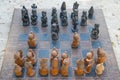 African chess, hand made from baobab wood. African style wooden figurine, local art Royalty Free Stock Photo