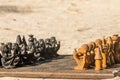 African chess, hand made from baobab wood. African style wooden figurine, local art Royalty Free Stock Photo